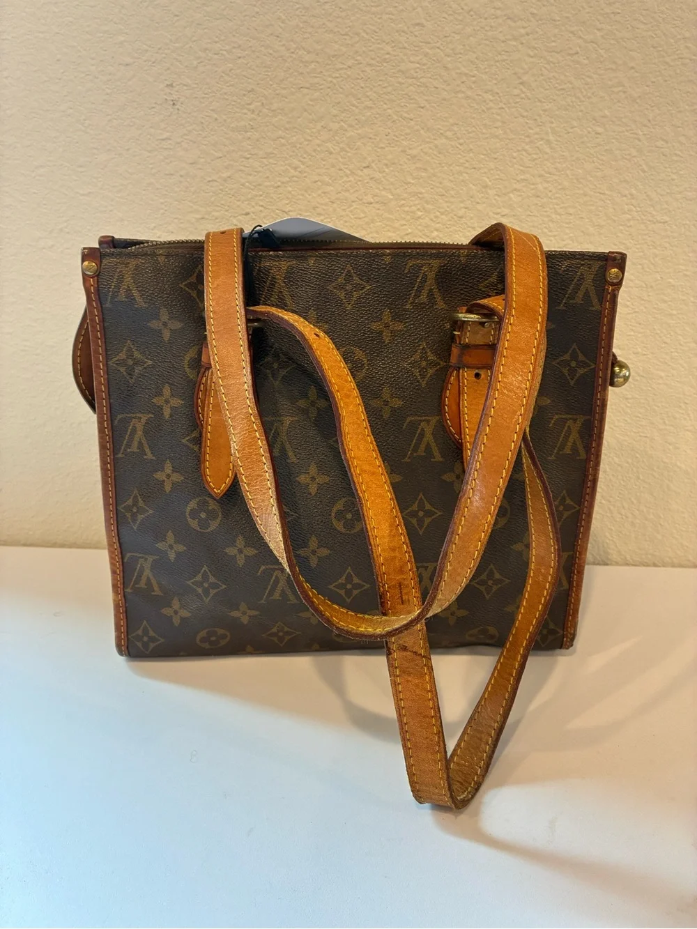 LOUIS VUITTON POPINCOURT HANDBAG.